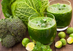 Fresh green vegetables with spinach smoothies